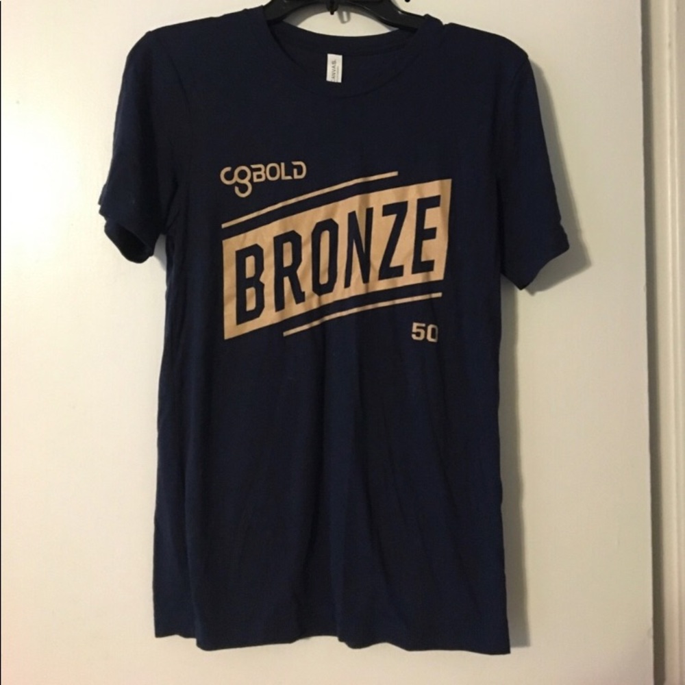 Camp Gladiator Size Medium Shirt Bronze 50 on Blue